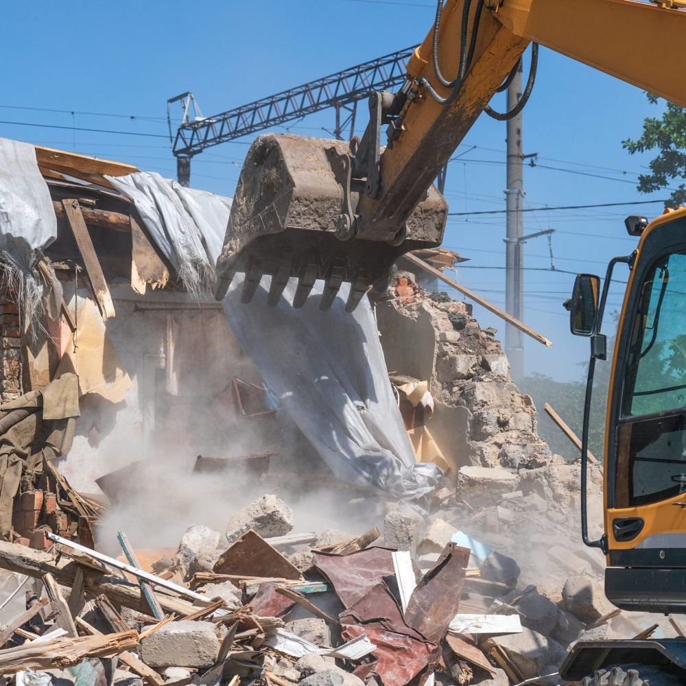 bigstock-Process-Of-Demolition-Of-Old-B-425781413-scaled